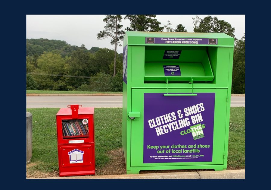 Clothes and shoes recycling bin and Little Free Library outside Fort Loudoun Middle School in Loudon Tennessee.