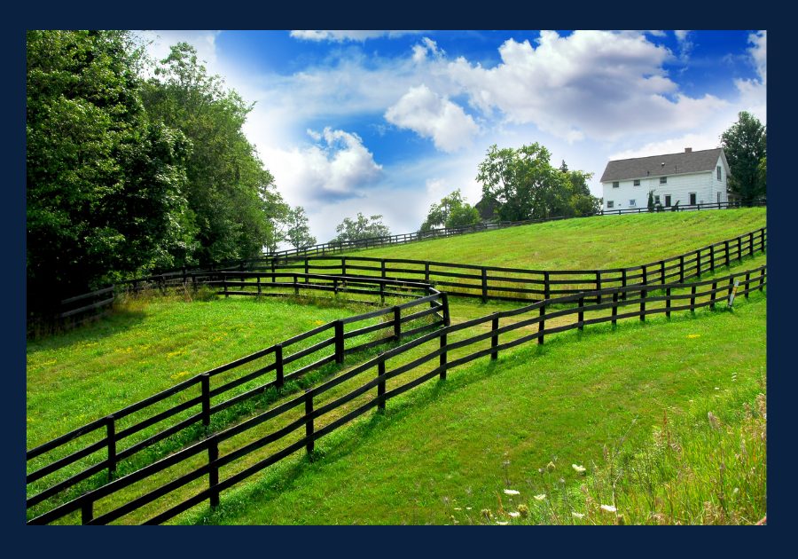Country home with fenced pasture and rolling hills in East Tennessee