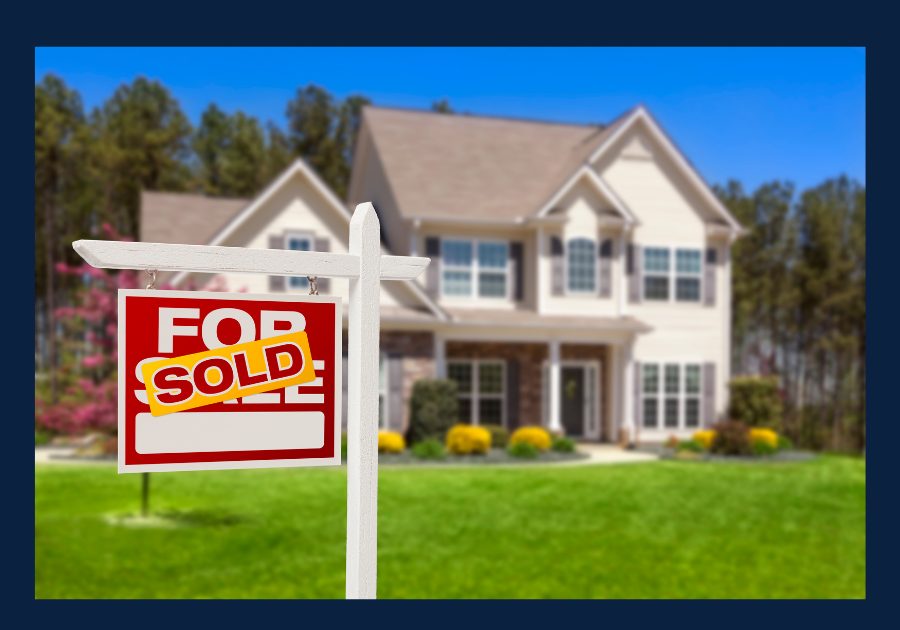Sold home in East Tennessee with real estate sign in front yard, representing the home buying process and successful property purchase in Tennessee.