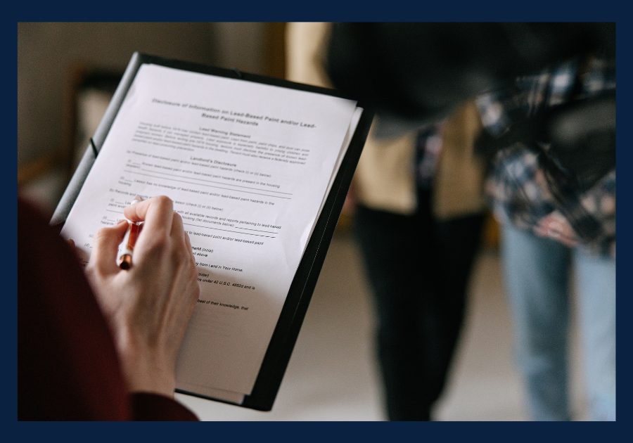 Homebuyer reviewing real estate documents during the East Tennessee home buying process.