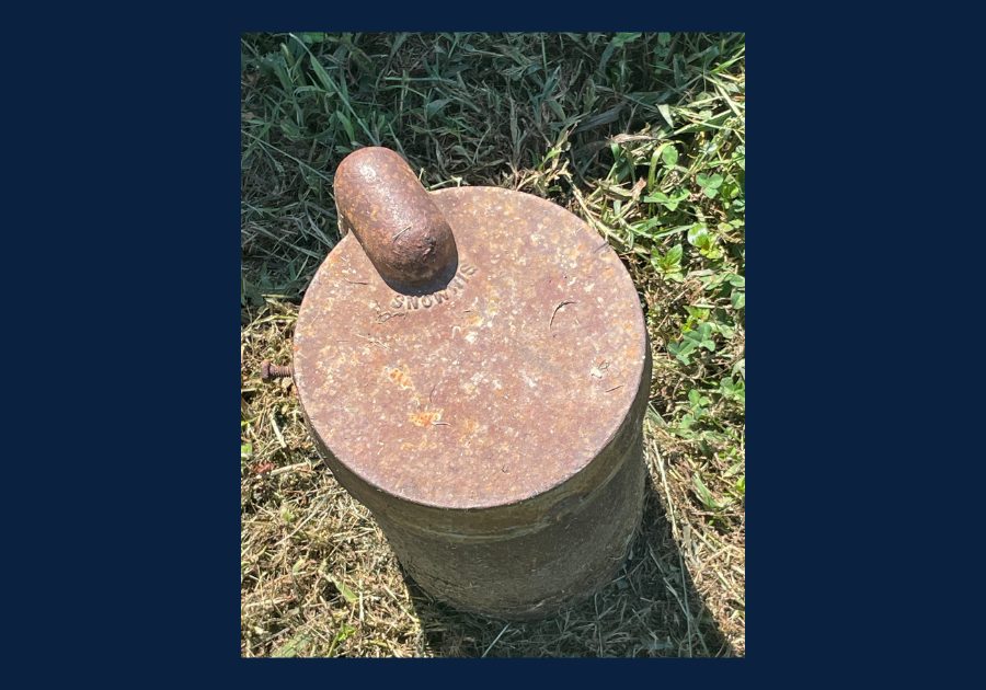 Metal well cap located in the yard of a rural East Tennessee property